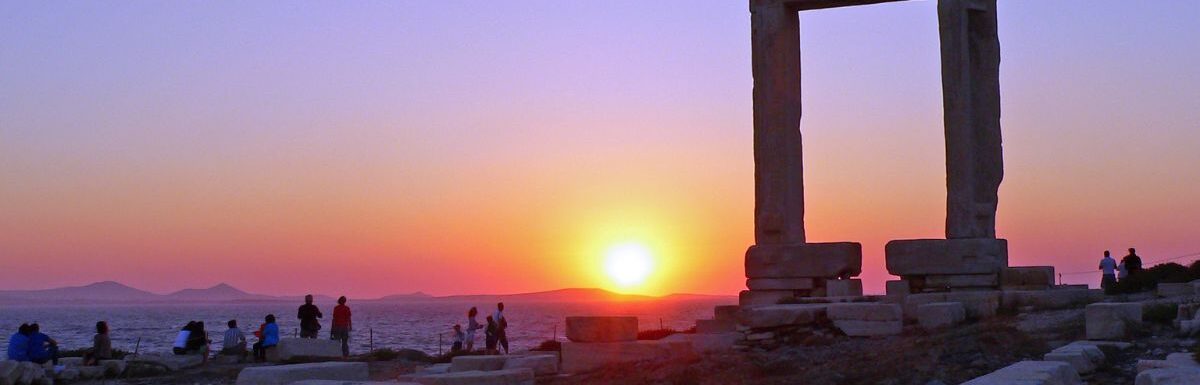 Sunset behind the Naxos arch in Greece.