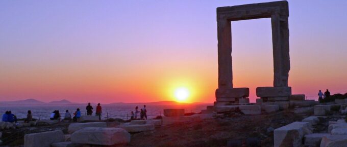Sunset behind the Naxos arch in Greece.