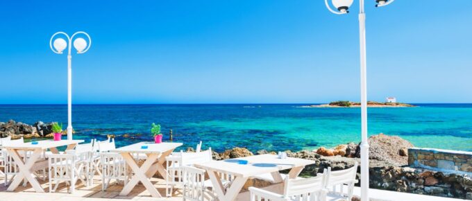 Beautiful tropical beach with turquoise water in Malia, Crete island, Greece.