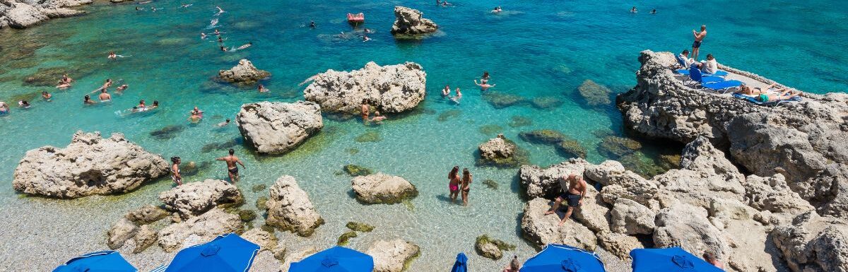 The summer beach, Rhodes Greece on a sunny day.