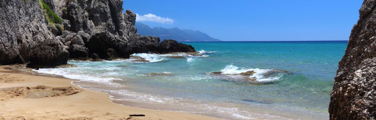 Myrtiotissa Beach below the cliffs in Corfu, Greece.