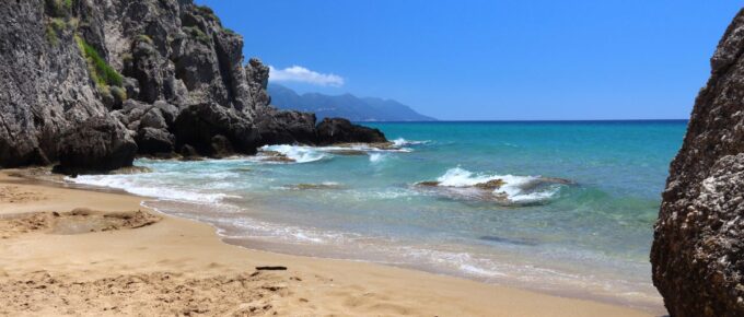 Myrtiotissa Beach below the cliffs in Corfu, Greece.