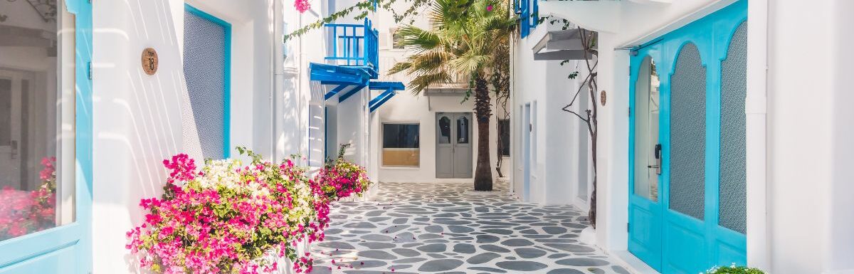 Beautiful architecture building exterior in Mykonos, Greece, during a sunny day.