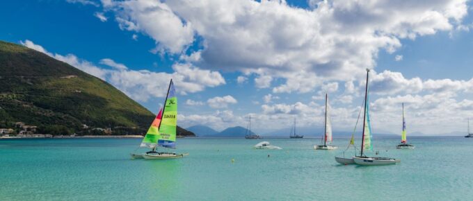 Sailing boats in Vasiliki Bay, Lefkada, Greece on a hot summer day.