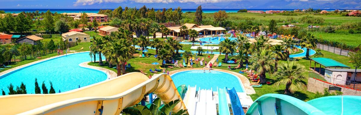 Outdoor Greek Aqua park with water slides swimming pools for children.