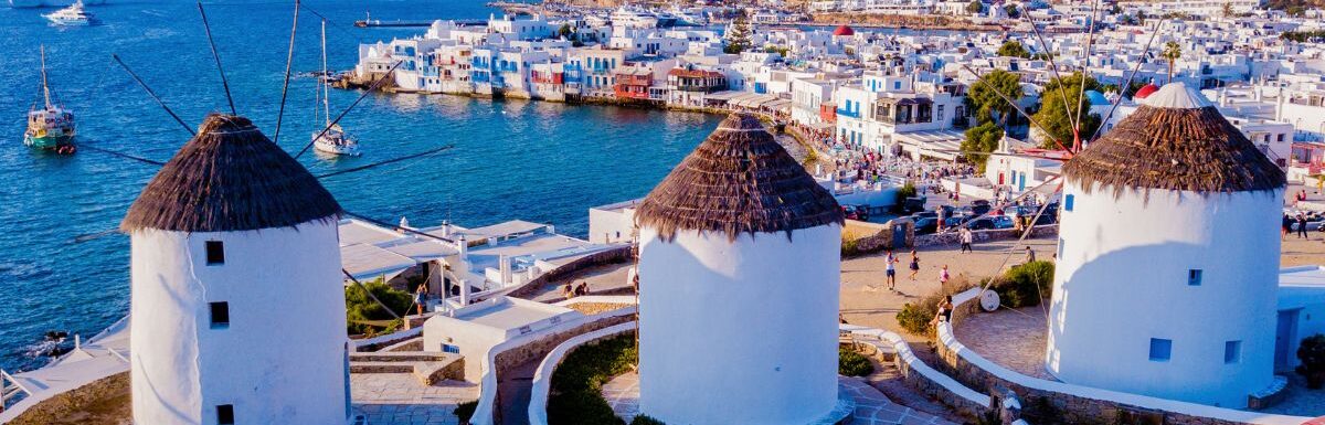 Mykonos Windmills at Sunset in Mykonos, Greece.