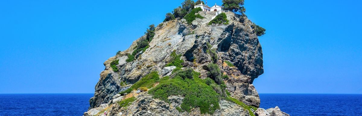 Mamma Mia church on top of a cliff, Skopelos, Greece.