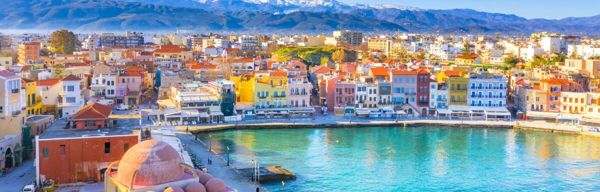 Aerial view of Chania with the amazing lighthouse, mosque, venetian shipyards, Crete, Greece.