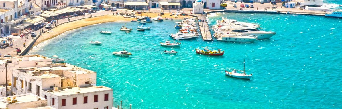 Mykonos Town Chora and Harbor during the day.