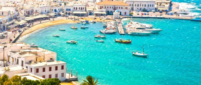 Mykonos Town Chora and Harbor during the day.