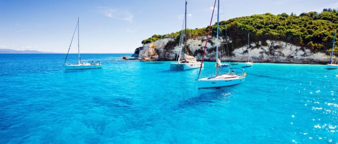 Sailboats in a beautiful bay, Paxos island, Greece.