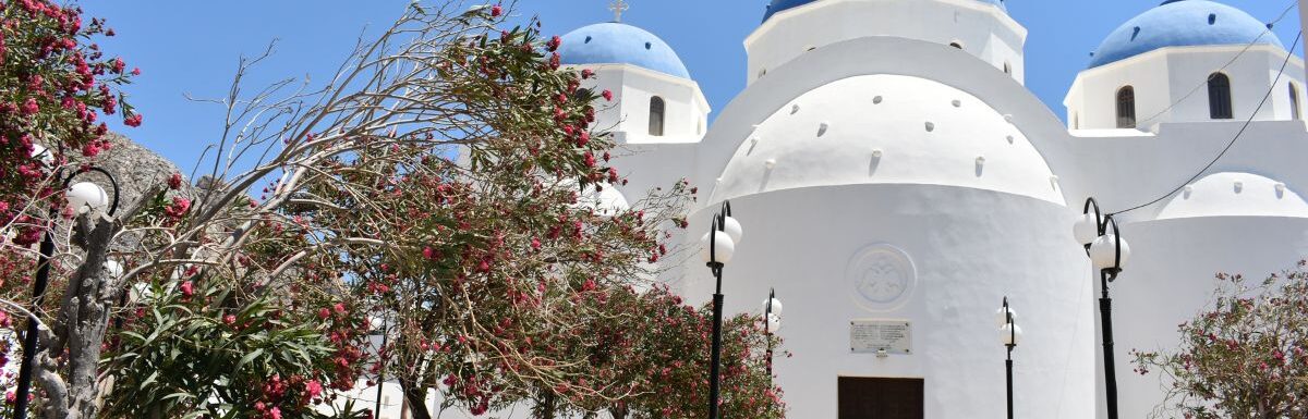 Blue and white Church of the Holy Cross, Greek orthodox church in Perissa, Santorini, Greece.