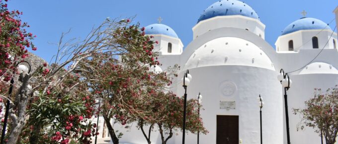 Blue and white Church of the Holy Cross, Greek orthodox church in Perissa, Santorini, Greece.