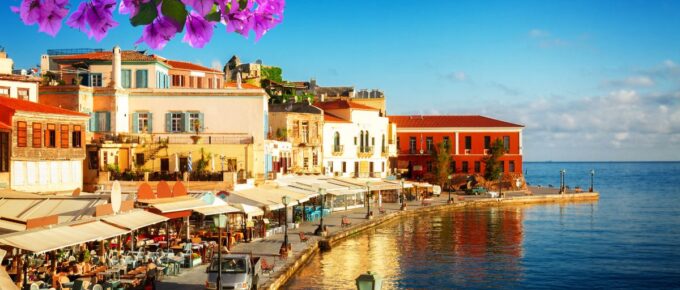 Bay of Chania at sunny summer day, Crete Greece with flowers.
