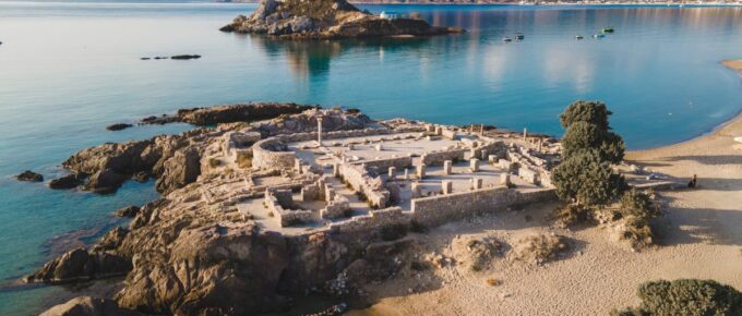 An aerial view of the ancient Agios Stefanos Basilica in the foreground in Kos, Greece.