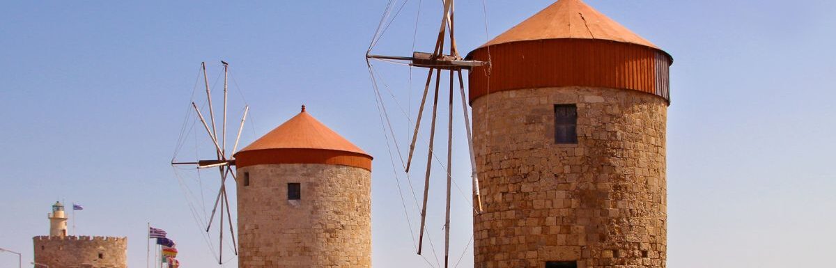 Windmills, Mandraki harbour, Rhodes, Greece in March of 2020.