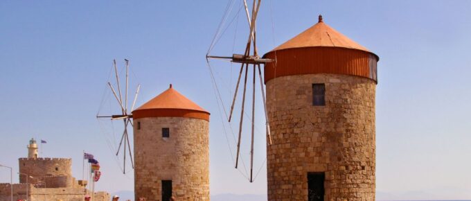 Windmills, Mandraki harbour, Rhodes, Greece in March of 2020.