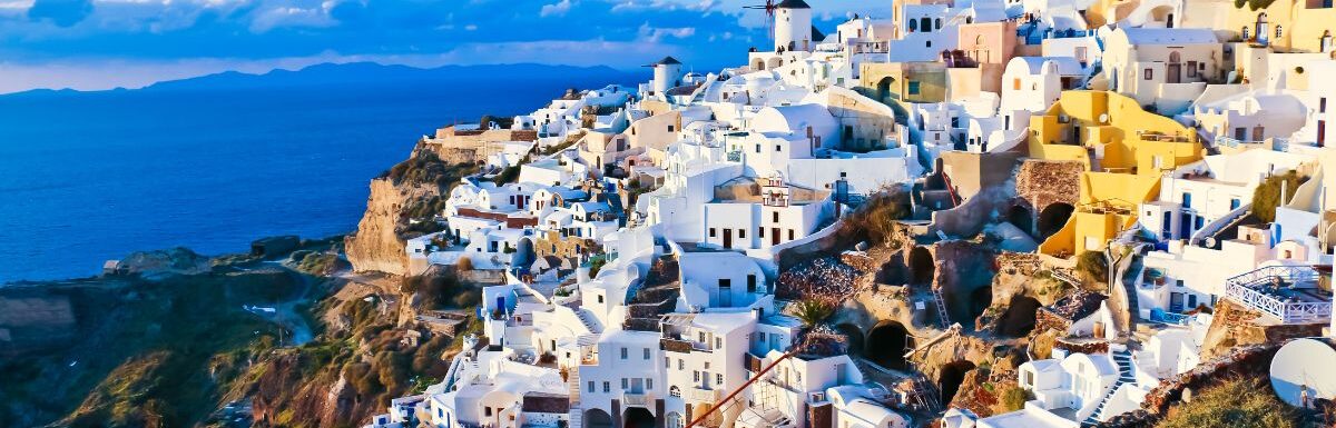 Panoramic view of Oia village in Santorini, Greece.