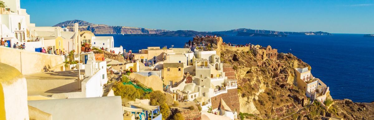 Picturesque clifftop view in unique Oia town, Santorini, Greece in September.