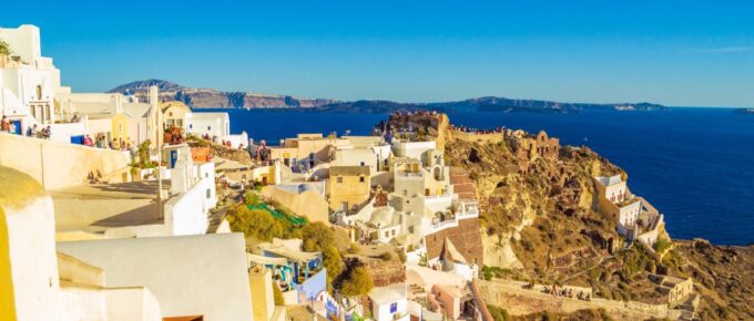 Picturesque clifftop view in unique Oia town, Santorini, Greece in September.